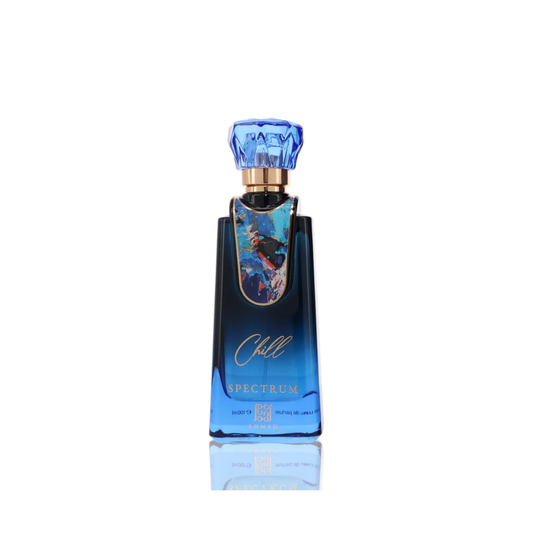 Blue perfume bottle with a colorful label on a white background
