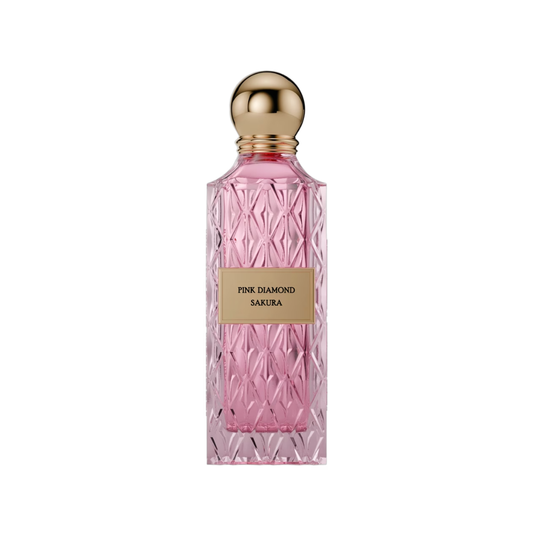 Pink Diamond Sakura perfume bottle with a textured pink glass body, a gold metallic label, and a spherical gold cap, centered on a white background.
