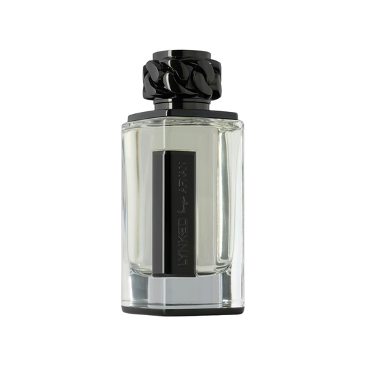 Clear perfume bottle with black cap on a white background