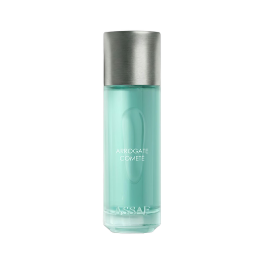 Assaf Arrogate Comete skincare bottle with a metallic silver cap and a translucent mint green glass body, shown on a solid white background.