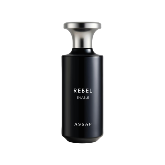 Assaf Rebel Enable fragrance bottle, featuring a matte black cylindrical body with a metallic silver cap, set against a plain white background.