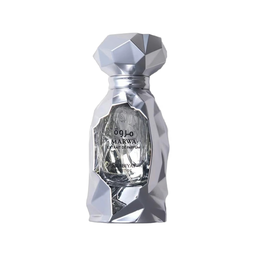 A faceted silver perfume bottle with a geometric, diamond-like cap and body, featuring the brand name 'MARWA' and 'EAU DE PARFUM' printed on the front, set against a plain white background.