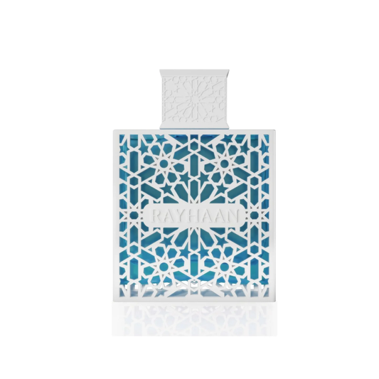 A rectangular perfume bottle with a white geometric cutout pattern over blue panels and a white cap, centered on a white background with a faint reflection below.